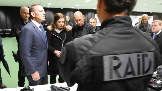 Australian prime minister Tony Abbott visiting RAID's offices in France.