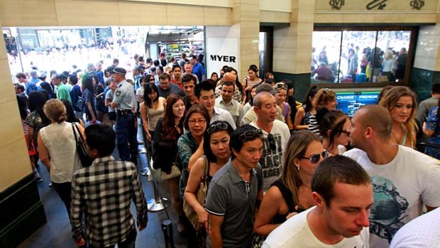 Go shop: A Boxing Day sale draws plenty of shoppers.
