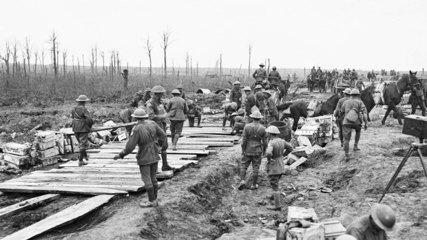 The 2nd Australian Pioneer Battalion making a wagon track from planks of wood at Chateau Wood during the Battle of Passchendaele. 