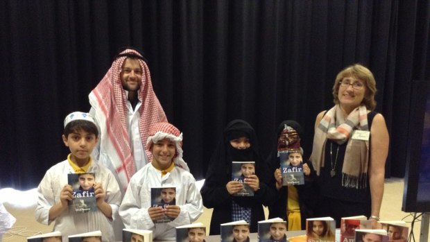 New understanding: Prue Mason, author of Zafir, with teachers and students at Serpell Primary school's Middle Eastern day.