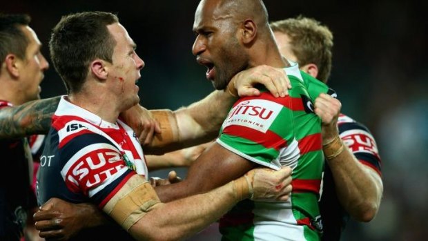Difference of opinion: James Maloney faced off with Lote Tuqiri on Thursday.