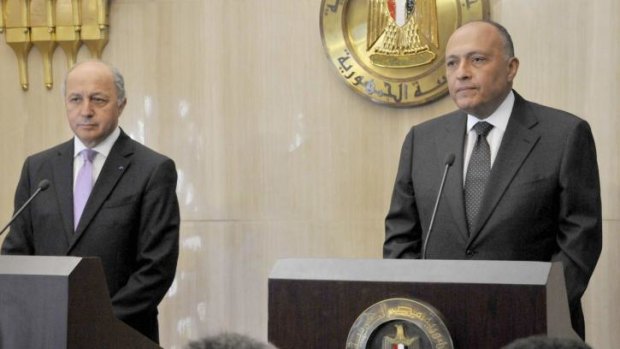 Egyptian Foreign Minister Sameh Shukri (right) with French Foreign Minister Laurent Fabius in Cairo on Saturday. Mr Fabius said ceasefire talks had failed.