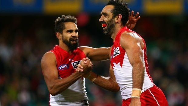 Proud pair: Lewis Jetta and Adam Goodes celebrate a goal against West Coast.