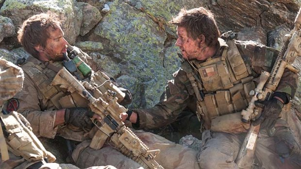 Under fire: <i>Lone Survivor</i>, based on a book about the near-fatal experiences of a Navy Seal, has much in common with <i>Black Hawk Down</i>.