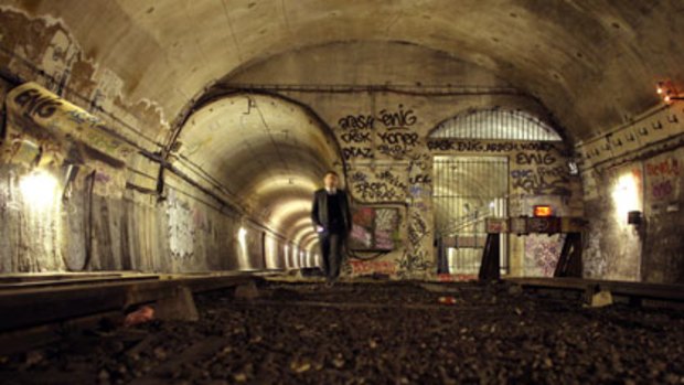 A transport employee in the tunnel linking the Porte des Lilas metro station to Haxo, one of the several "ghost" metro stations in Paris.