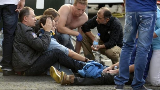 Paramedics attend to the wounded at a monster truck festival in Haaksbergen.