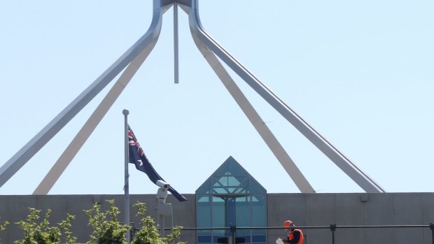 Workers construct new security infrastructure at the ministerial entrance to Parliament House in Canberra on Thursday 15 October 2015. Photo: Andrew Meares