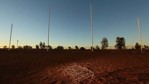 Blood in the sand as killing cuts town in two