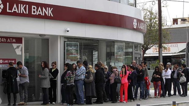 Huge queues outside a branch of Laiki Bank in Nicosia.