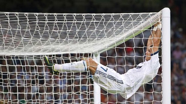 Swinging success &#8230; Real Madrid's Cristiano Ronaldo during the second leg of the Spanish Super Cup against Barcelona.