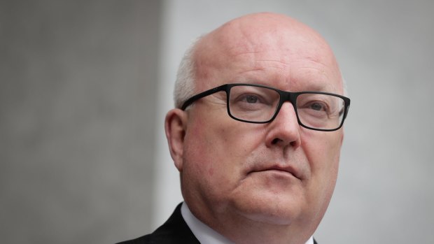 "Family violence is not a private matter, it is criminal behaviour": Attorney-General George Brandis.