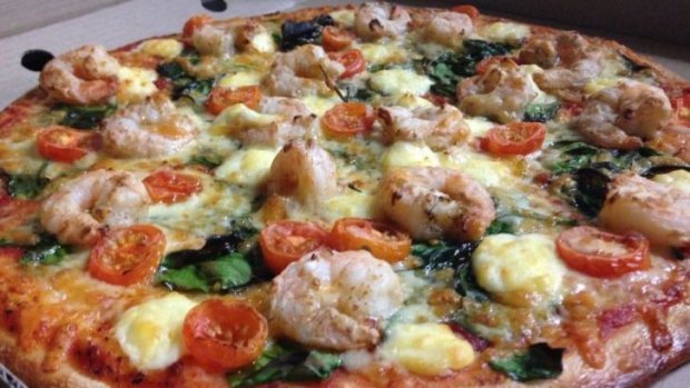 The garlic-prawn pizza is one of the most popular on the Greenwood Pizza menu.