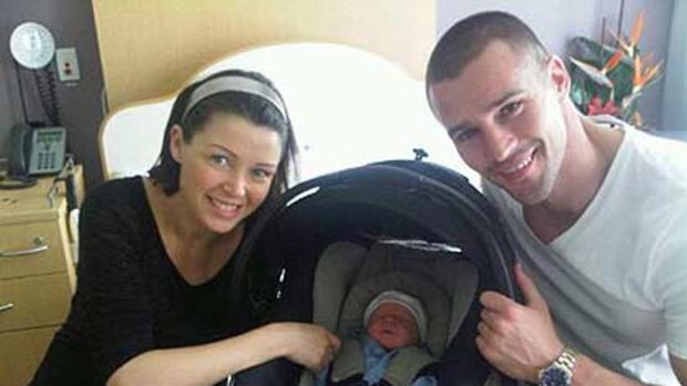Dannii Minogue and boyfriend Kris Smith with their new addition - baby Ethan Edward.