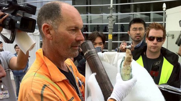 Two time capsules have been discovered underneath a statue damaged in the quake.