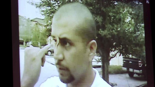 A reenactment video showing George Zimmerman, taken the after the Trayvon Martin shooting, is projected for the jury during Zimmerman's second-degree murder trial in Seminole circuit court in Sanford, Florida, July 1, 2013.