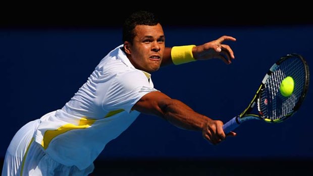 Jo-Wilfried Tsonga stretches for a backhand.