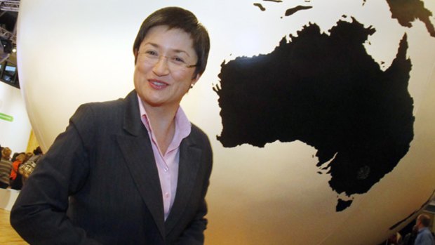 Australia's Minister for Climate Change and Water Penny Wong stands near a large globe in the main hall at the UN Climate Change Conference 2009 in Copenhagen.