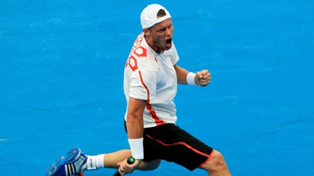 All in vain &#8230; Lleyton Hewitt's best efforts weren't enough as Victor Troicki scored a three-set win at Sydney Olympic Park Tennis Centre. His first-round loss leaves Matthew Ebden as  the sole hometown hope for the tournament.
