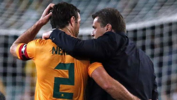 Men on a mission: Socceroos coach Ange Postecoglou (right) with captain Lucas Neill.