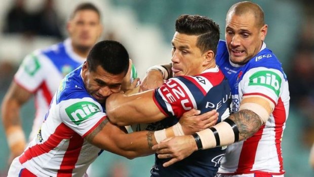 Roosters forward Sonny Bill Williams can't escape the Knights on this occasion.
