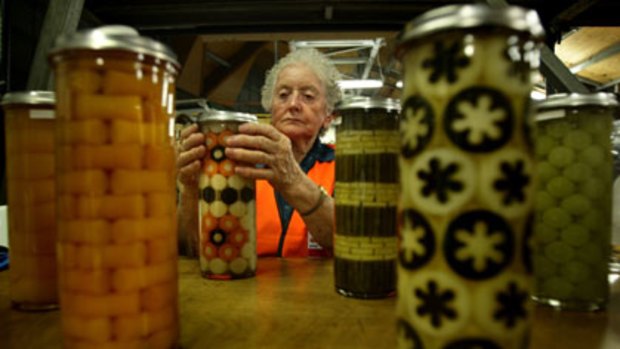 Seal of approval ... Betty Wilcox, 80,  puts the finishing touches to her entries in the preserved fruit and vegetable contest at the Sydney Royal Easter Show.