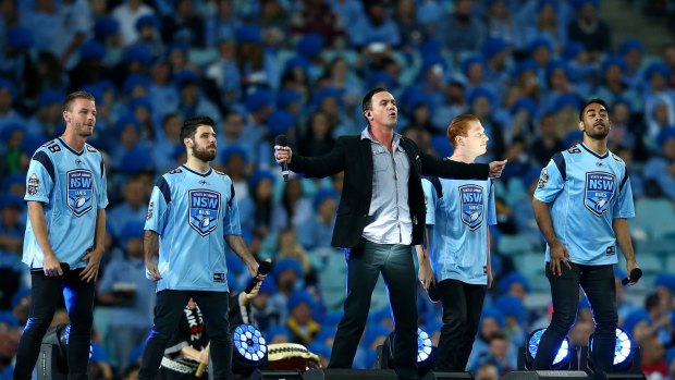Shannon Noll performs before the State of Origin opener at ANZ Stadium.