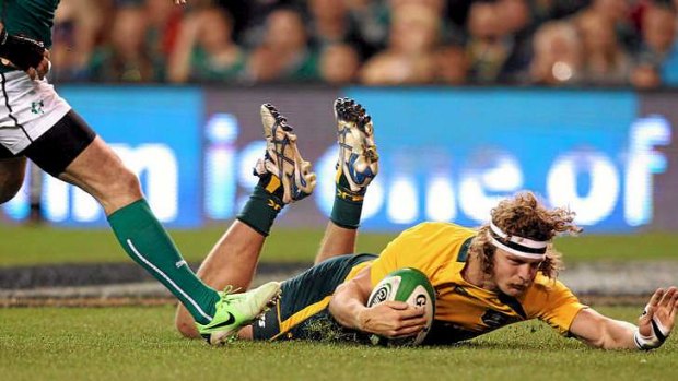 Nick Cummins will return to the wing for Australia against Wales.