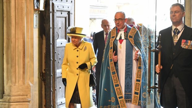 Queen Elizabeth II and John Hall, the Dean of Westminster arrive for a Commonwealth Day Service at Westminster Abbey.