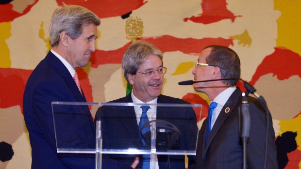 US Secretary of State John Kerry, left, Italian Foreign Minister Paolo Gentiloni, centre, and UN special envoy for Libya Martin Kobler.
