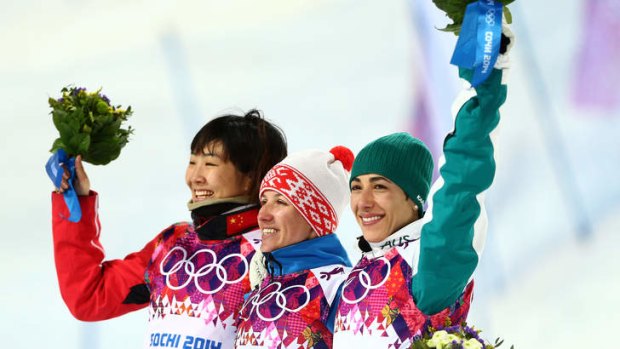 Standing tall: Silver medalist Xu Mengtao of China (left), gold medalist Alla Tsuper of Belarus (centre) and bronze medalist Lydia Lassila.