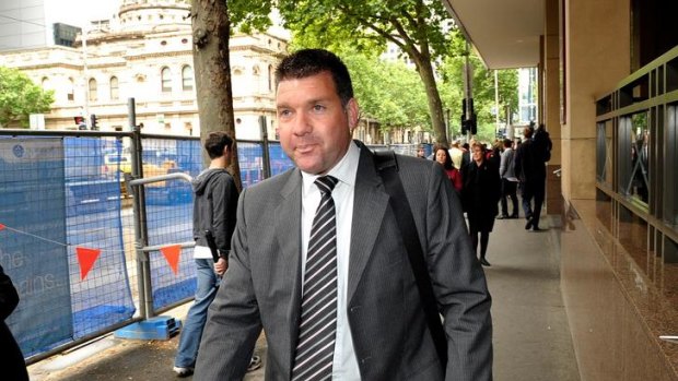 Suspended Victorian Police officer Senior Constable Simon Artz outside the Melbourne Magistrates' Court earlier this month.