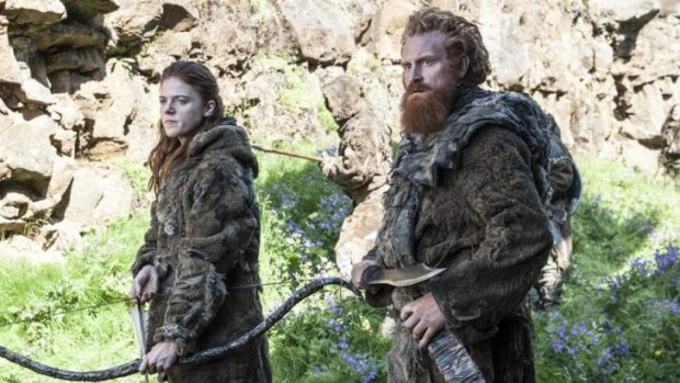 Baying for Crow blood ... Ygritte (Rose Leslie), left, is keen to shoot as many Night's Watch men as possible, including John Snow, while wildling leader Tormund (Kristofer Hivju) cuts down many men before being captured.