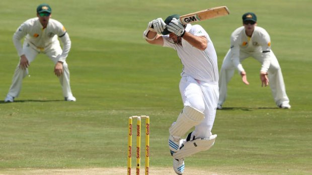 Handy delivery: South African skipper Graeme Smith fails to avoid a Mitchell Johnson bouncer, gloving it to Shaun Marsh.