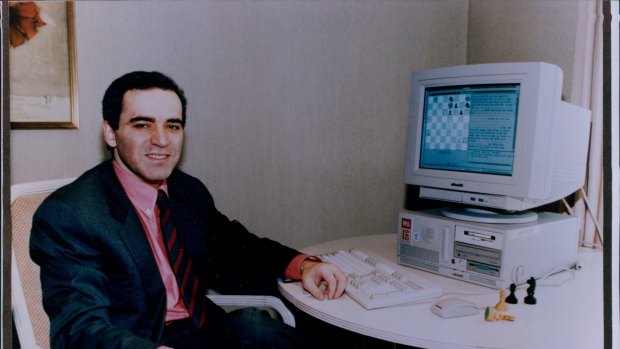 Gary Kasparov with the Pentium Computer programmed to compete with him in a game of chess. It ended with victory for Kasparov in 1995.