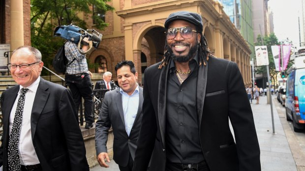 West Indies' Cricket player Chris Gayle leaves court in Sydney.