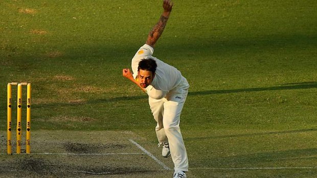 Mitchell Johnson in full cry on day four of the first Test at the Gabba.