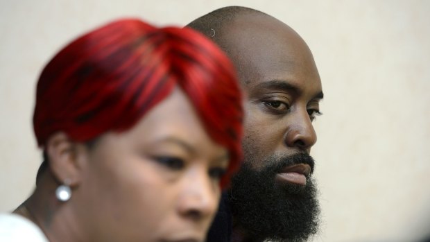 Lesley McSpadden, left, and Michael Brown, Sr, parents of slain teenager Michael Brown who was shot by a policeman in Ferguson, Missouri.