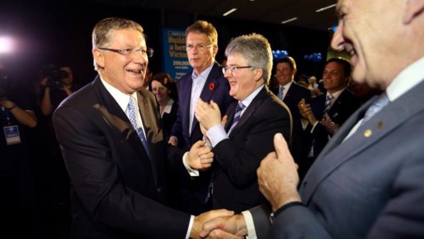 Thumbs up: Dr Napthine shakes hands with former Premier Jeff Kennett, with Victorian Liberal Party President Tony Snell and former Premier Ted Baillieu in the background.