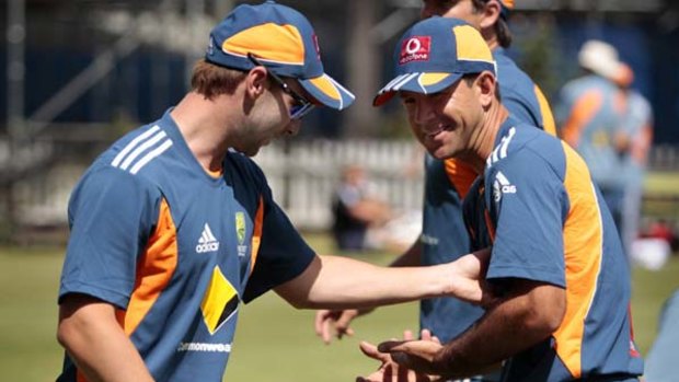 Smiles all round as Ricky Ponting and Phil Hughes warm up for the third Test.