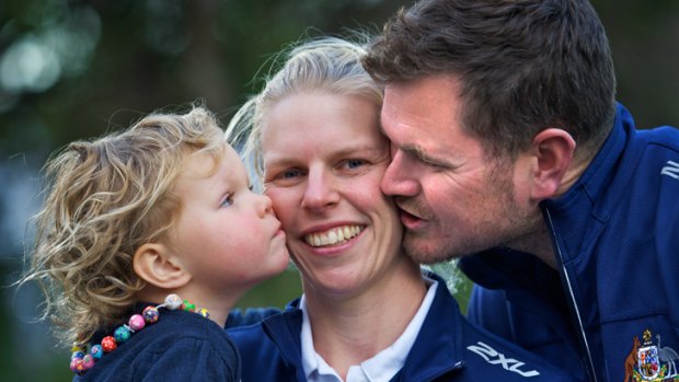 Hurt: Sarah Tait (centre), with husband Bill and daughter Leila, has a forearm injury.