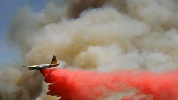 Picturesque but perilous: An airtanker drops fire retardant over the Gap fires raging in the Los Padres National Forest near Santa Barbara, in northern California.