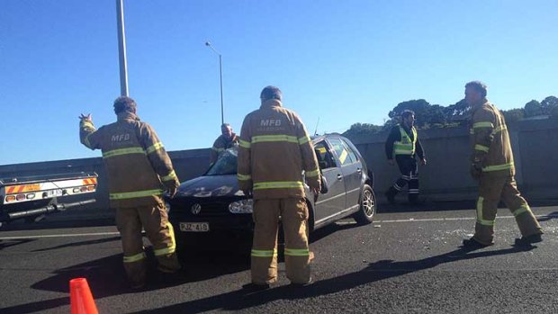 A two-car crash in the right hand lanes of the Tullamarine Freeway is caused major hold-ups.