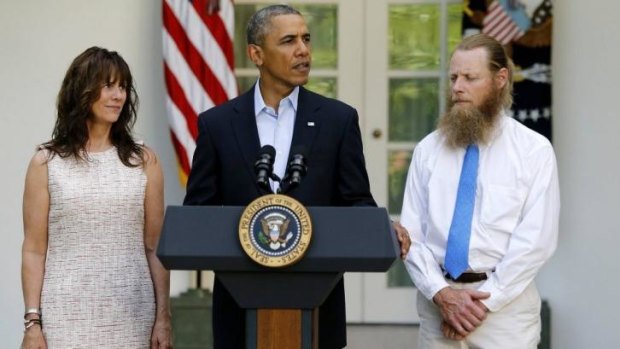 Relief ... US President Barack Obama stands with Bob Bergdahl (right) and Jami Bergdahl (left) as he delivers a statement about the release of their son, prisoner of war US Army Sergeant Bowe Bergdahl, on Saturday.