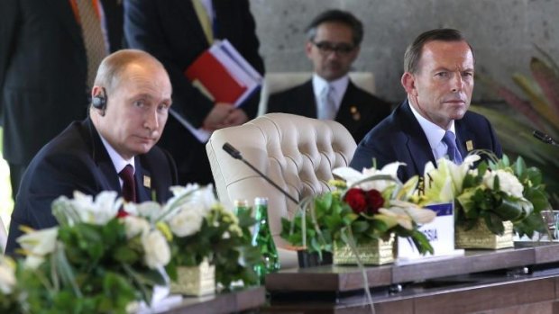 Russian President Vladimir Putin and Prime Minister Tony Abbott during the APEC Economic Leaders' Meeting.