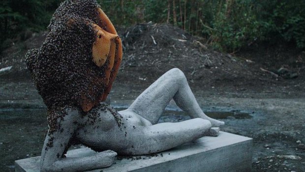 Pierre Huyghe, Untilled (Liegender Frauenakt), 2012, concrete cast on steel armature with beehive, live bee colony, plastic, and wax. 