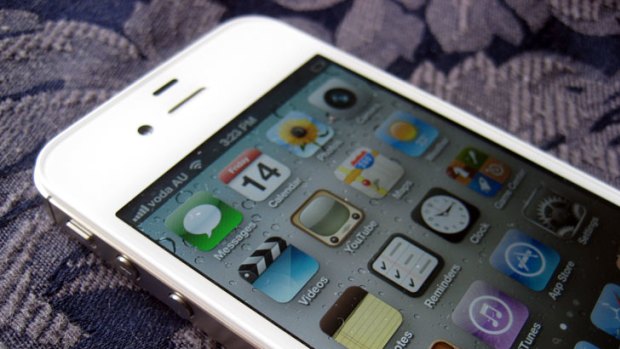 The release of Apple's iPhone 4S generated record sales - but may have prompted some consumers to hold off purchases.