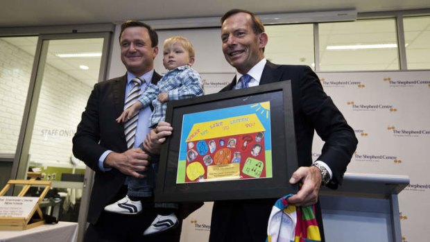 Colourful occasion: Tony Abbott at the opening of a Newton cochlear implant centre.