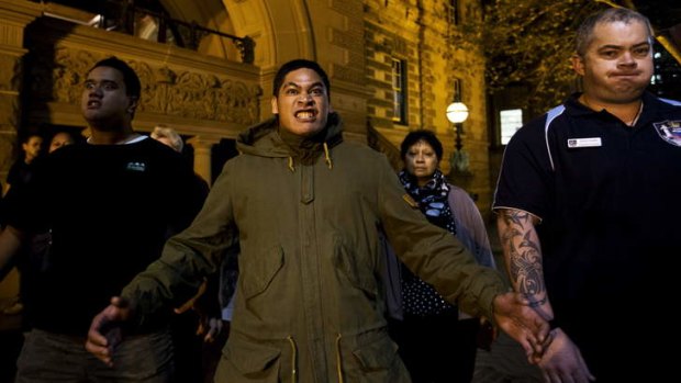 Protesters perform the haka outside the Intercontinental last night.