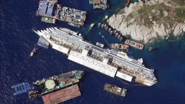 An aerial view shows of Costa Concordia after it crashed last year.