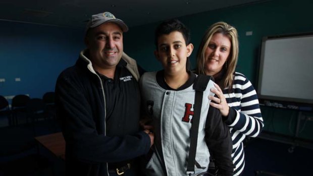 ''I feel lucky'' ... Daniel Sammut, 15, with his parents Tony and Rachael, uses a battery pack that powers an implant while he waits for a donor organ.